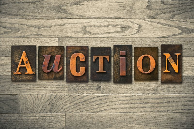 IMG: antique-looking auction sign