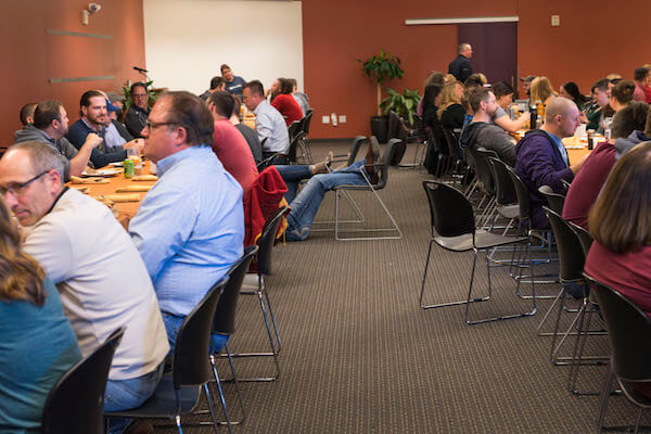 IMG: people laying under the thanksgiving table