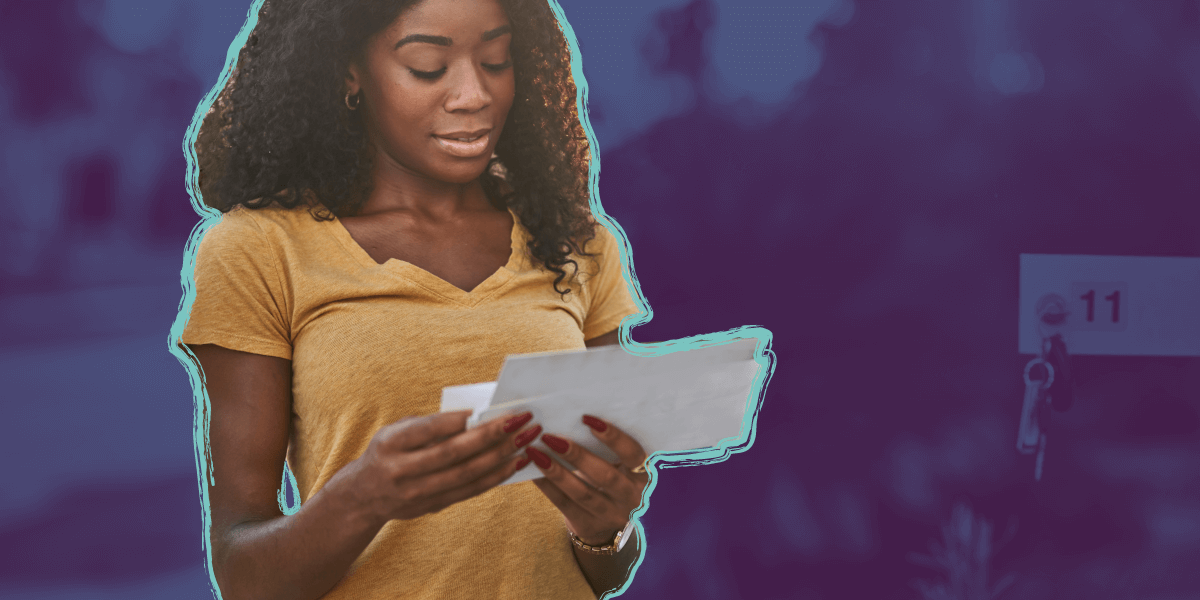 a woman sorting her direct mail