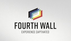Fourth-Wall-Business_Card_1 Logo with overlapping rectangles in blue, black, yellow, and red above the words "FOURTH WALL" and the tagline "EXPERIENCE CAPTIVATED" on a light background.